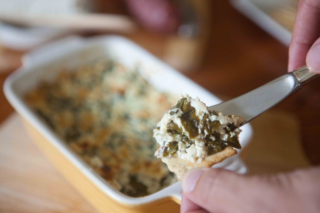  baked basil cheese dip on a cracker